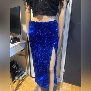 Blue sequins dress with split.